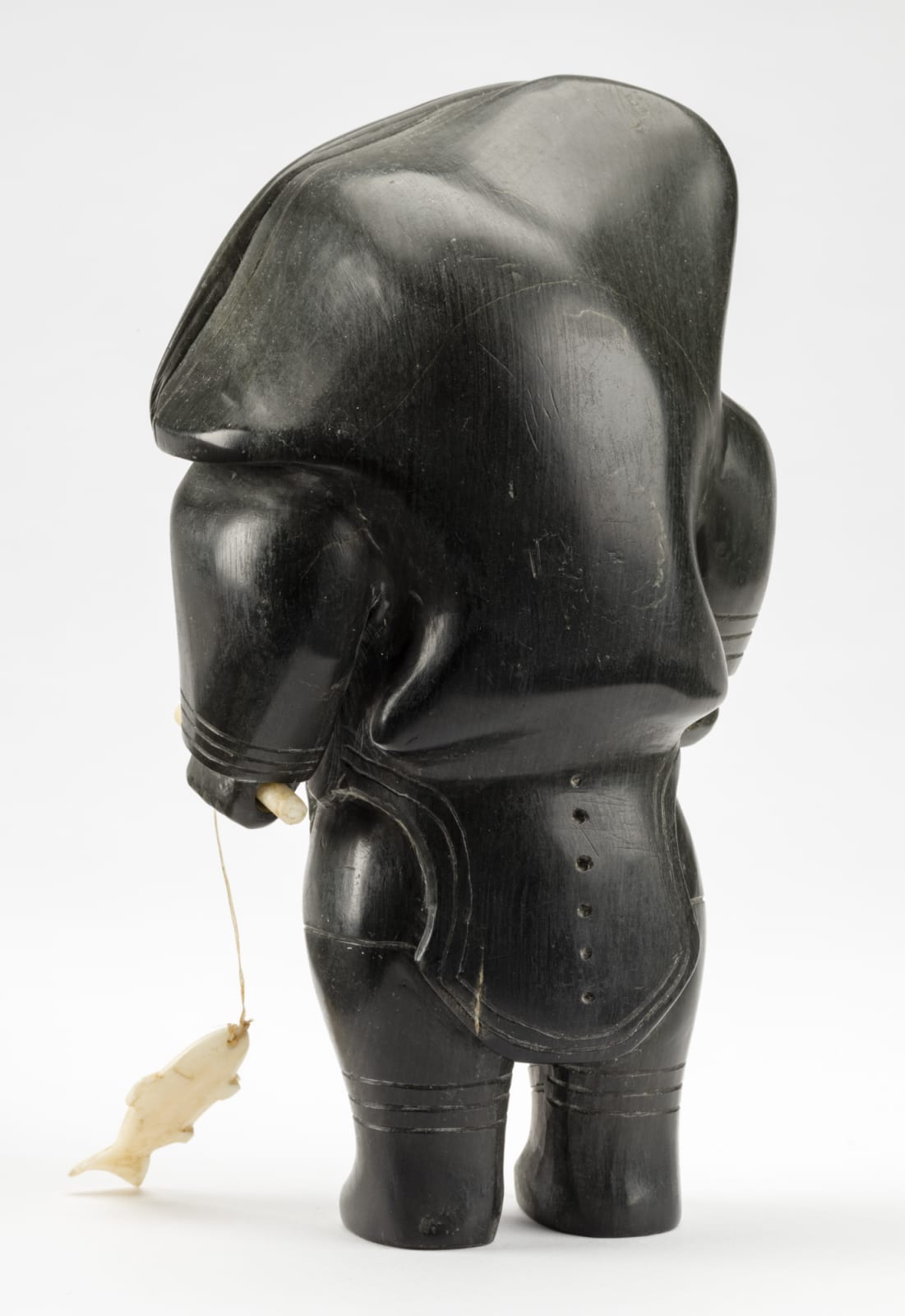 UNIDENTIFIED ARTIST, PROBABLY SANIKILUAQ (BELCHER ISLANDS), Mother and Child, with Fish and Ulu, c. 1950-55