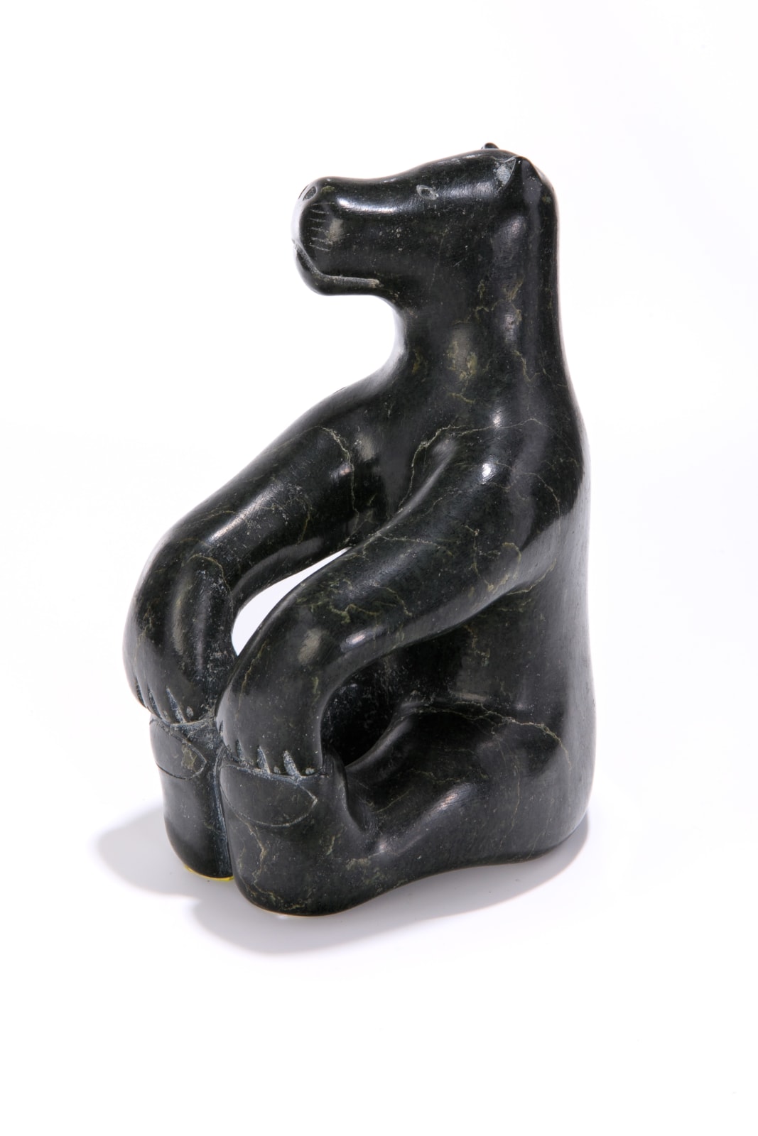 ABRAHAM POV (1927-1994) INUKJUAK (PORT HARRISON), Contented, Seated Polar Bear, 1970s
