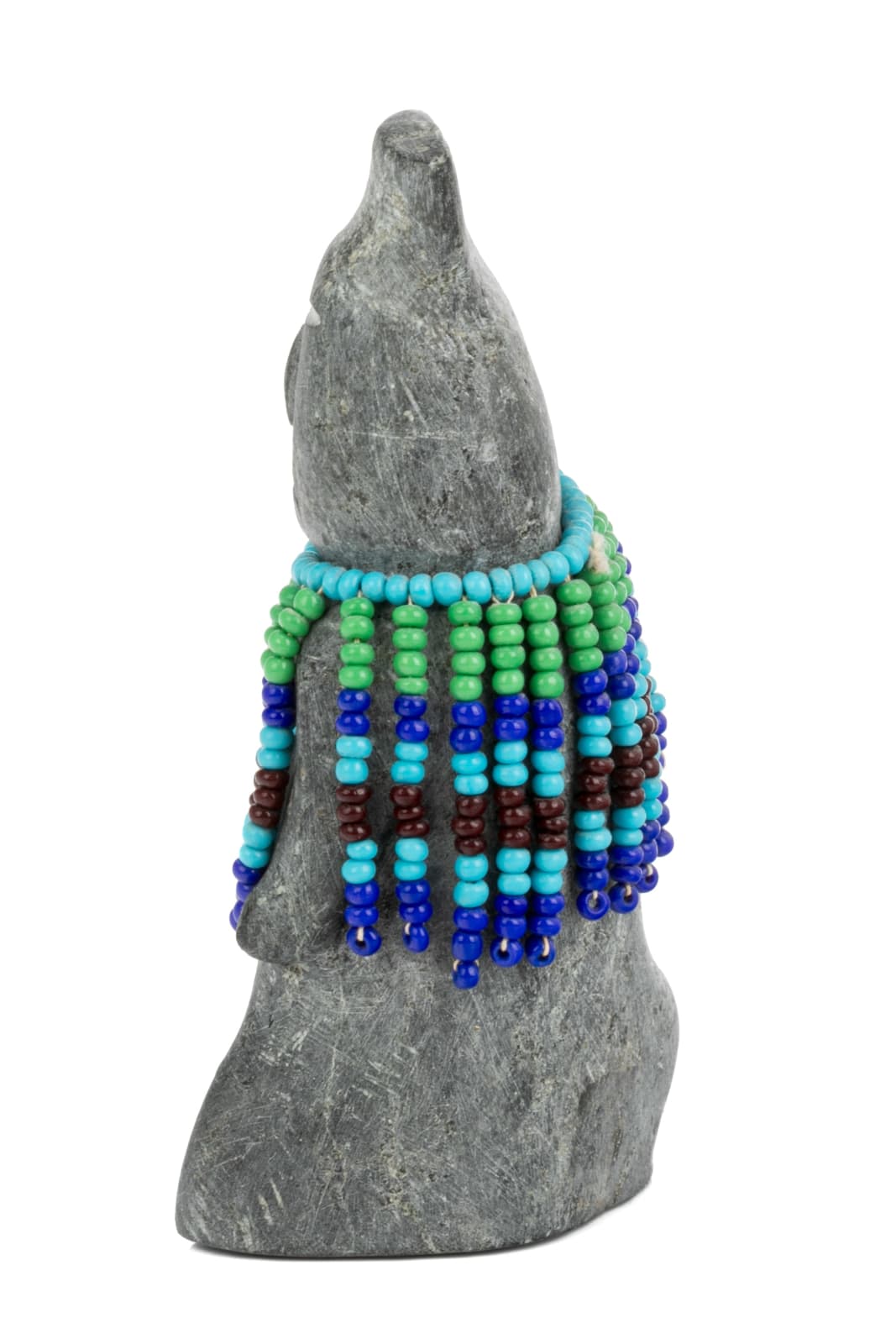 EVA TALOOKI ALIKTILUK (1927-1994) ARVIAT (ESKIMO POINT), Woman in a Beaded Amautiq with Coiffed Hair