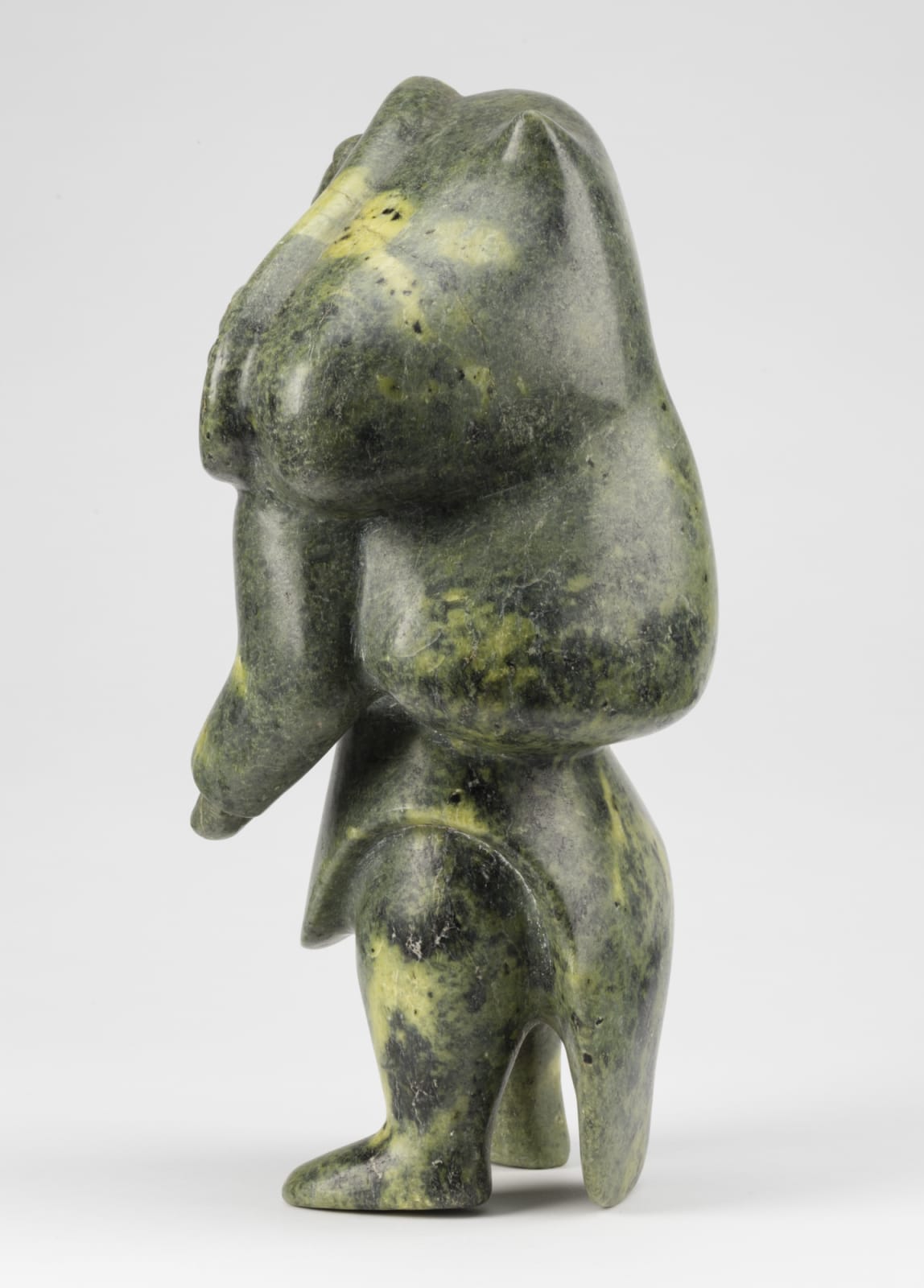 KUPPAPIK RAGEE (1931-1995) KINNGAIT (CAPE DORSET), A Standing Mother with Child, early 1960s