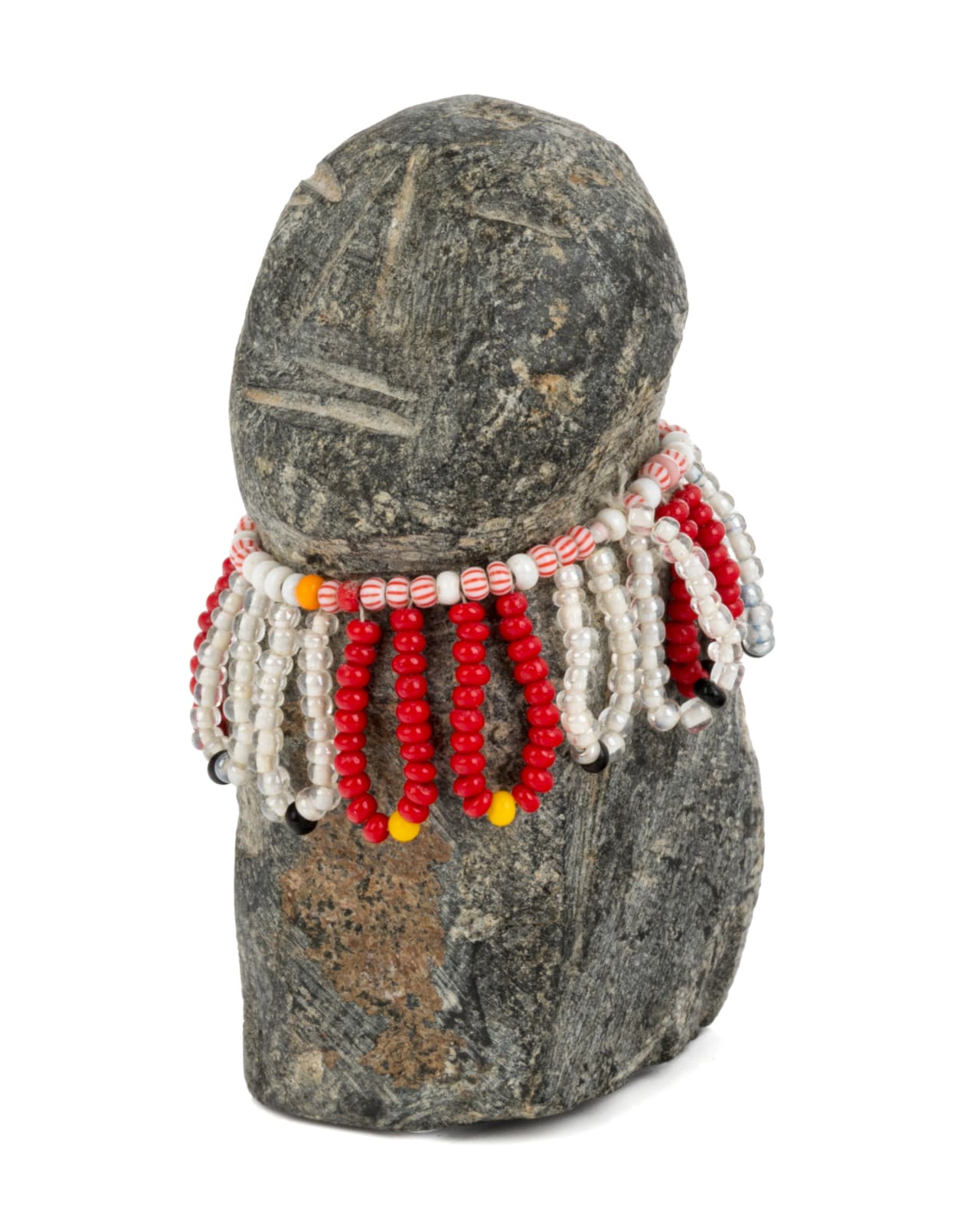 EVA TALOOKI ALIKTILUK (1927-1994) ARVIAT (ESKIMO POINT), Kneeling Woman in a Beaded Amautiq