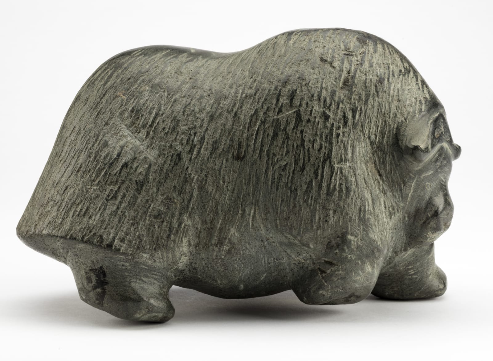 BARNABUS ARNASUNGAAQ (1924-2017) QAMANI'TUAQ (BAKER LAKE), Running Muskox, mid-1970s