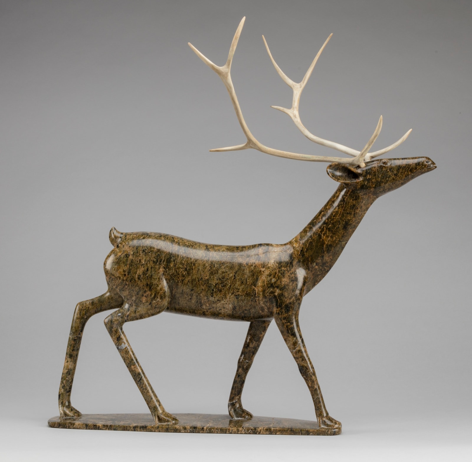 OSUITOK IPEELEE, R.C.A. (1922 or 1923-2005) KINNGAIT (CAPE DORSET, Walking Caribou, c. 1987-88