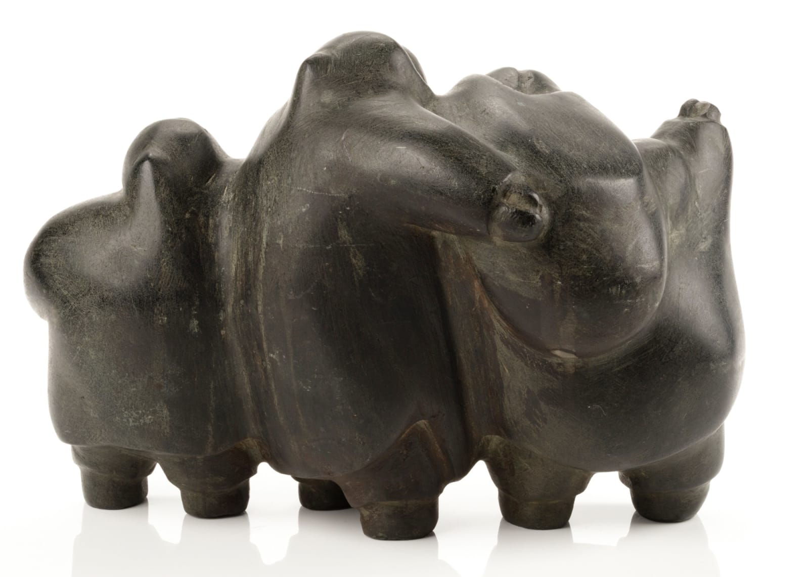 PETER SEVOGA (1940-2007) QAMANI’TUAQ (BAKER LAKE), Three Figures (Mother, Father, and Child), mid 1970s