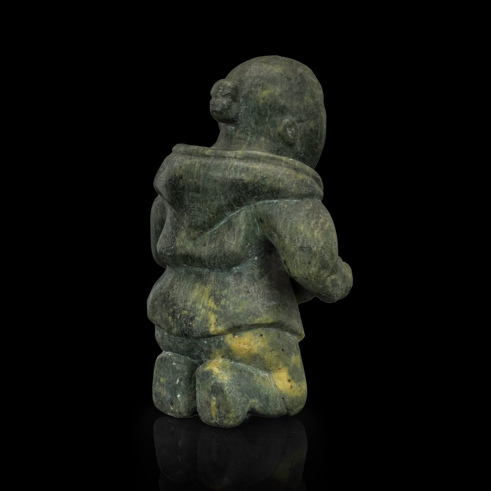 KIAKSHUK (1886-1966) KINNGAIT (CAPE DORSET), Kneeling Woman with Quilliq (Kudlik), c. 1960-63