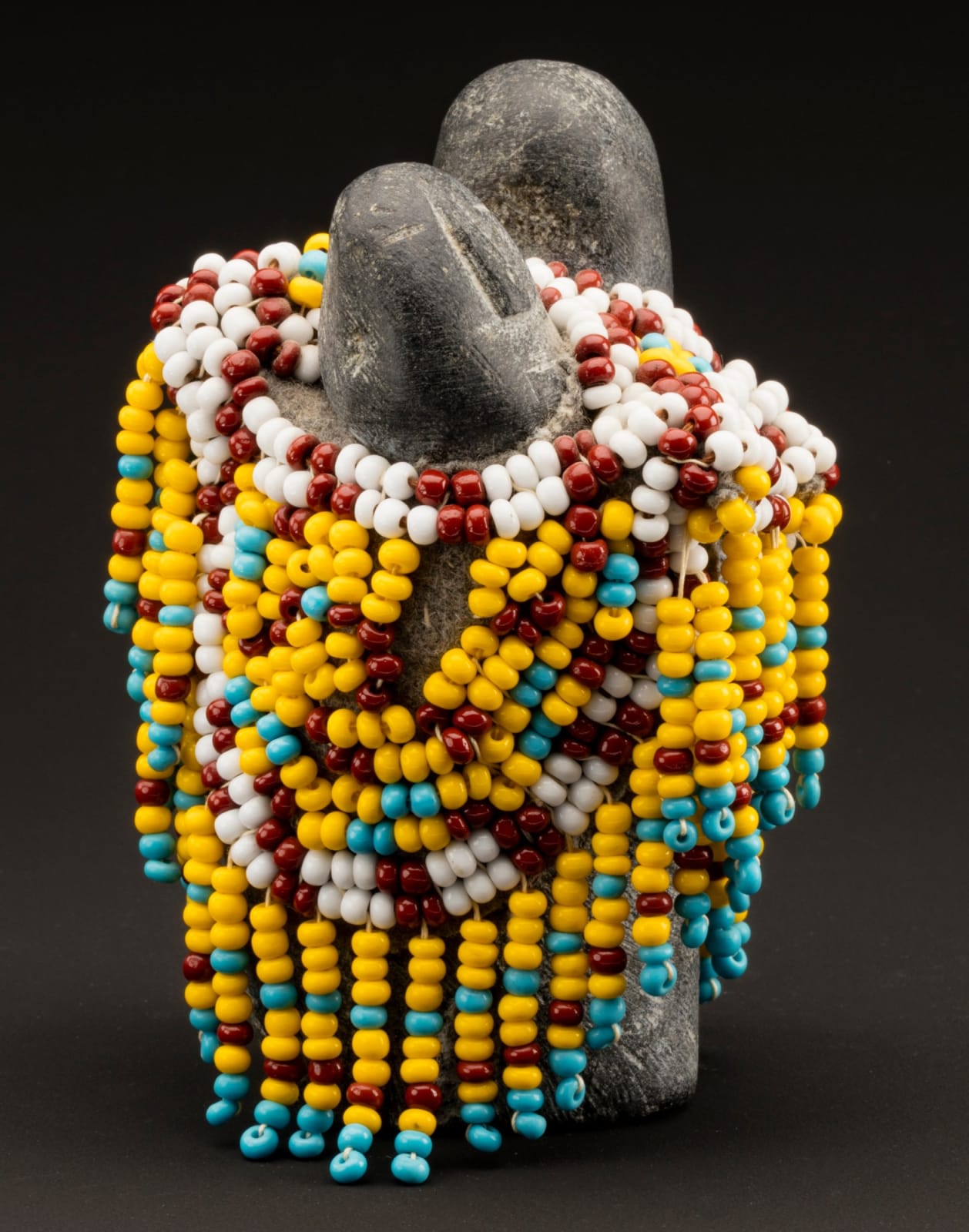 EVA TALOOKI ALIKTILUK (1927-1994) ARVIAT (ESKIMO POINT), Mother and Child in a Beaded Amautiq, c. 1990-91