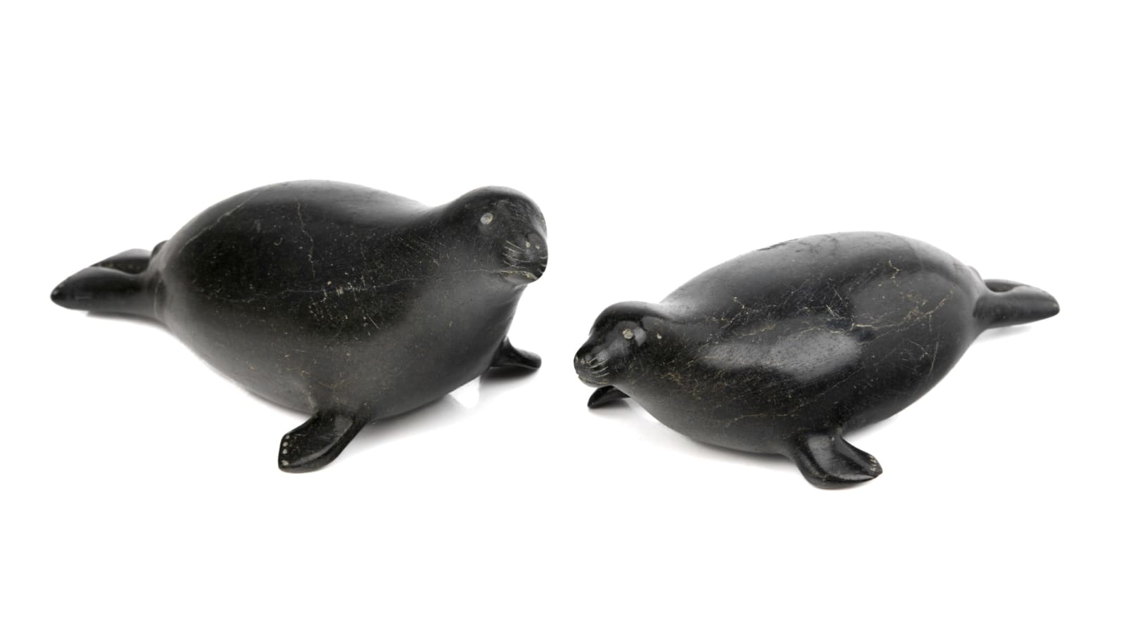 UNIDENTIFIED INUIT ARTIST, KIMMIRUT (LAKE HARBOUR), Two Seals, c. late 1950s / early 1960s