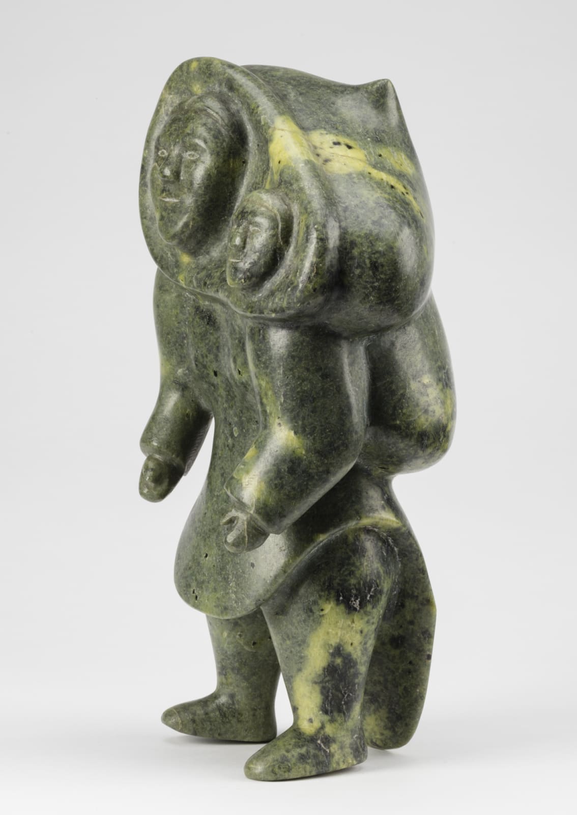 KUPPAPIK RAGEE (1931-1995) KINNGAIT (CAPE DORSET), A Standing Mother with Child, early 1960s