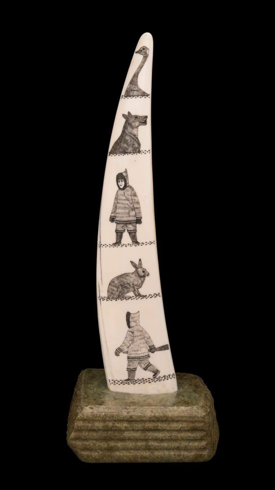 DAVIDEE ITULU (1929-2006) KIMMIRUT (LAKE HARBOUR), Incised Tusk with Inuit and Arctic Animals, mid-late 1970s