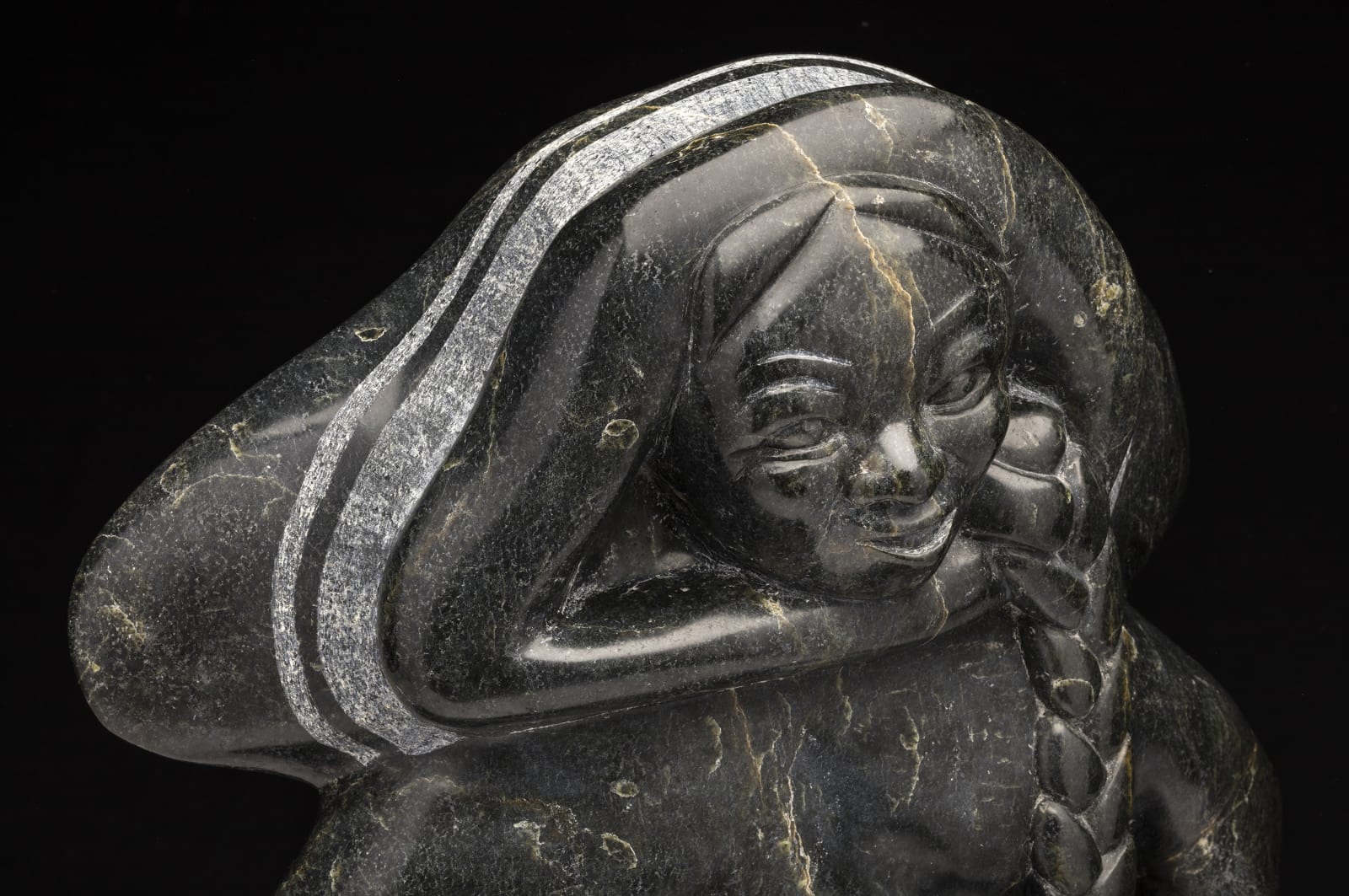 OSUITOK IPEELEE, R.C.A. (1922 or 1923-2005) KINNGAIT (CAPE DORSET, Young Woman Playing a Concertina, early 1980s