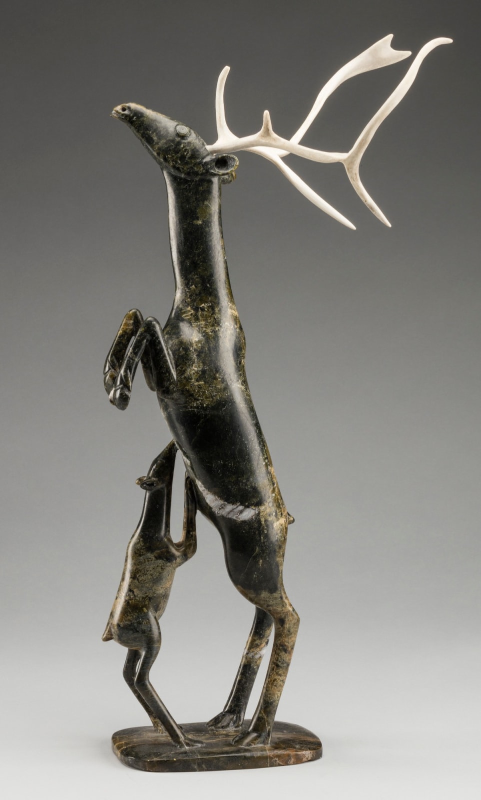 OSUITOK IPEELEE, R.C.A. (1922 or 1923-2005) KINNGAIT (CAPE DORSET, Rearing Caribou with Nursing Calf, 1994