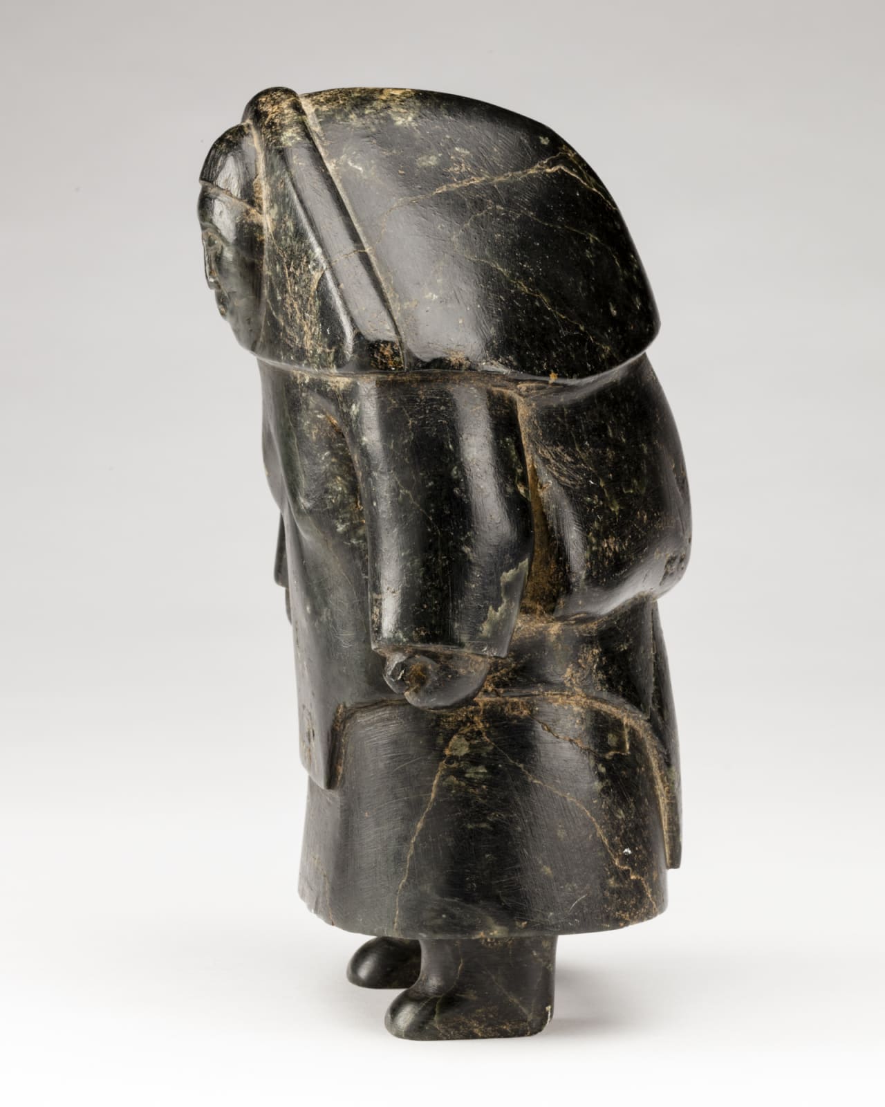 CONLUCY NAYOUMEALOOK (1891-1958) INUKJUAK (PORT HARRISON), Standing Woman in an Amautiq, mid-1950s