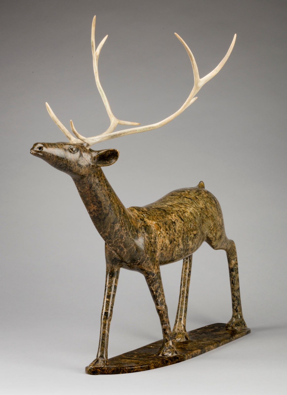 OSUITOK IPEELEE, R.C.A. (1922 or 1923-2005) KINNGAIT (CAPE DORSET, Walking Caribou, c. 1987-88