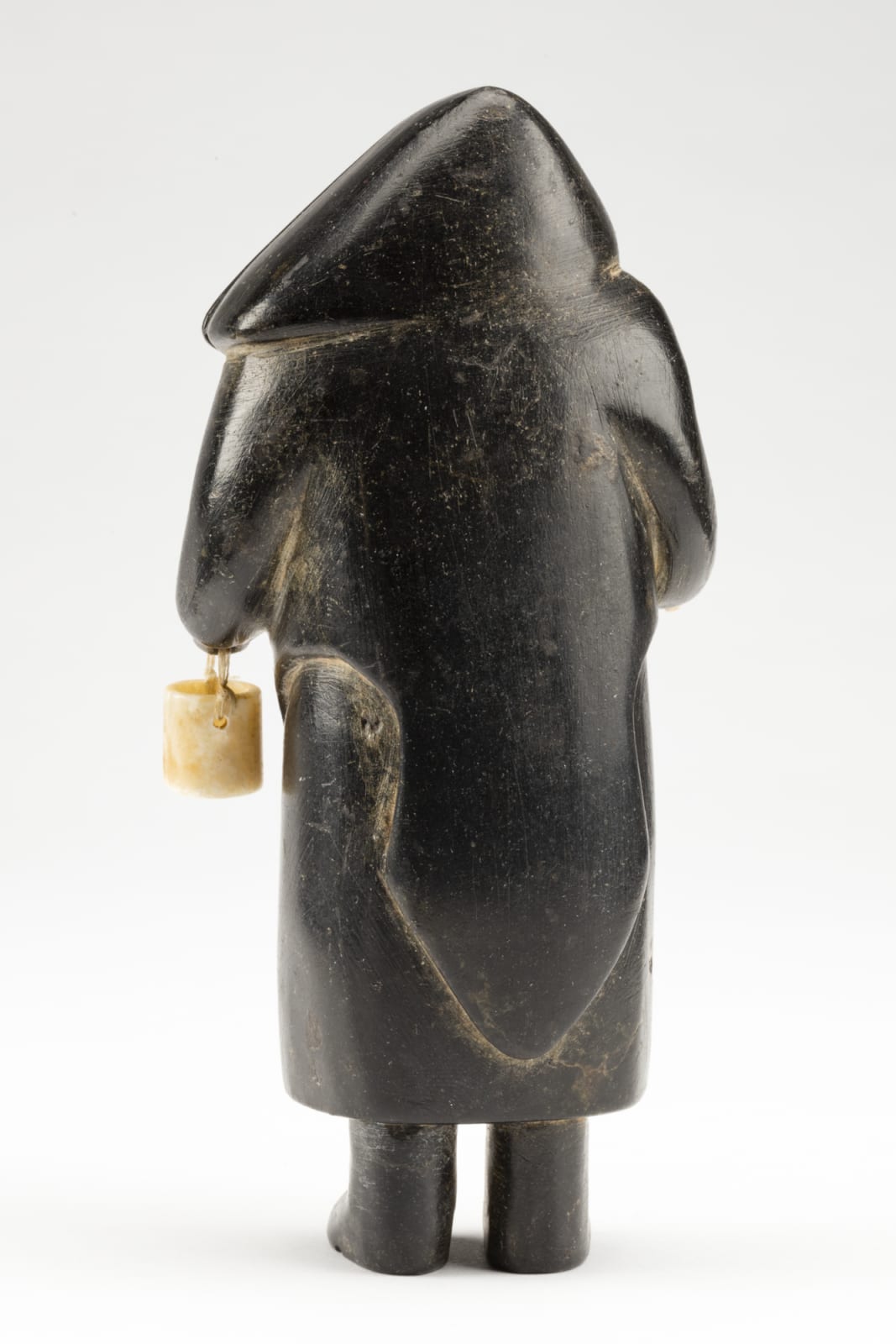 UNIDENTIFIED ARTIST, PROBABLY INUKJUAK (PORT HARRISON), Standing Woman with Pail and Ulu, c. 1949-50