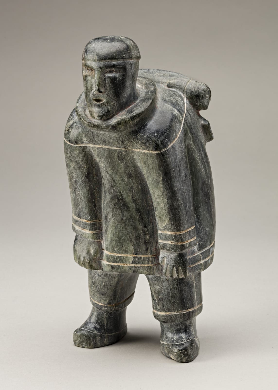 SOLOMONIE TIGULLARAQ (1924-2000) Kangiqtugaapik (Clyde River), Hunting Hauling Two Seals, c. 1966