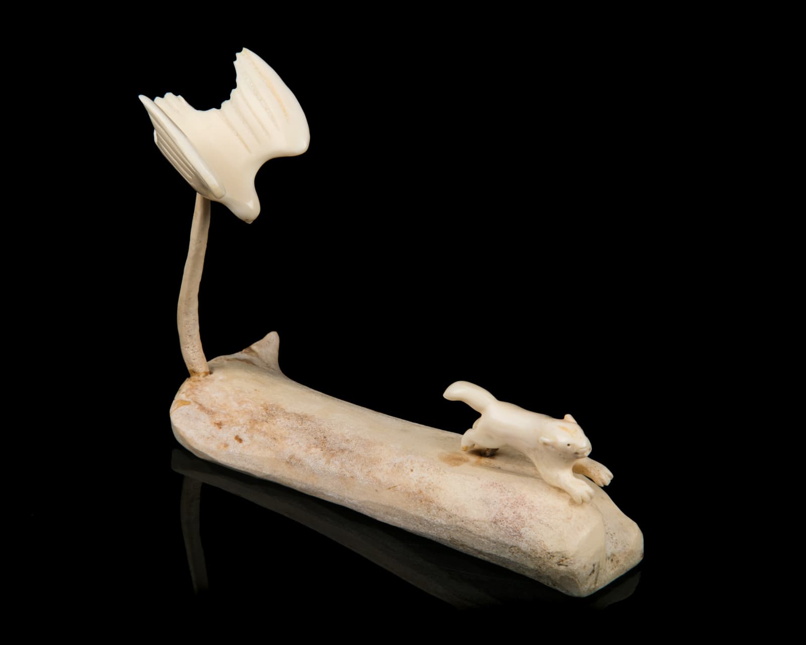 SOLOMON IQQUIYUITUQ (1946-) KUGAARUK (PELLY BAY), Hawk in Pursuit of a Lemming , 1970s