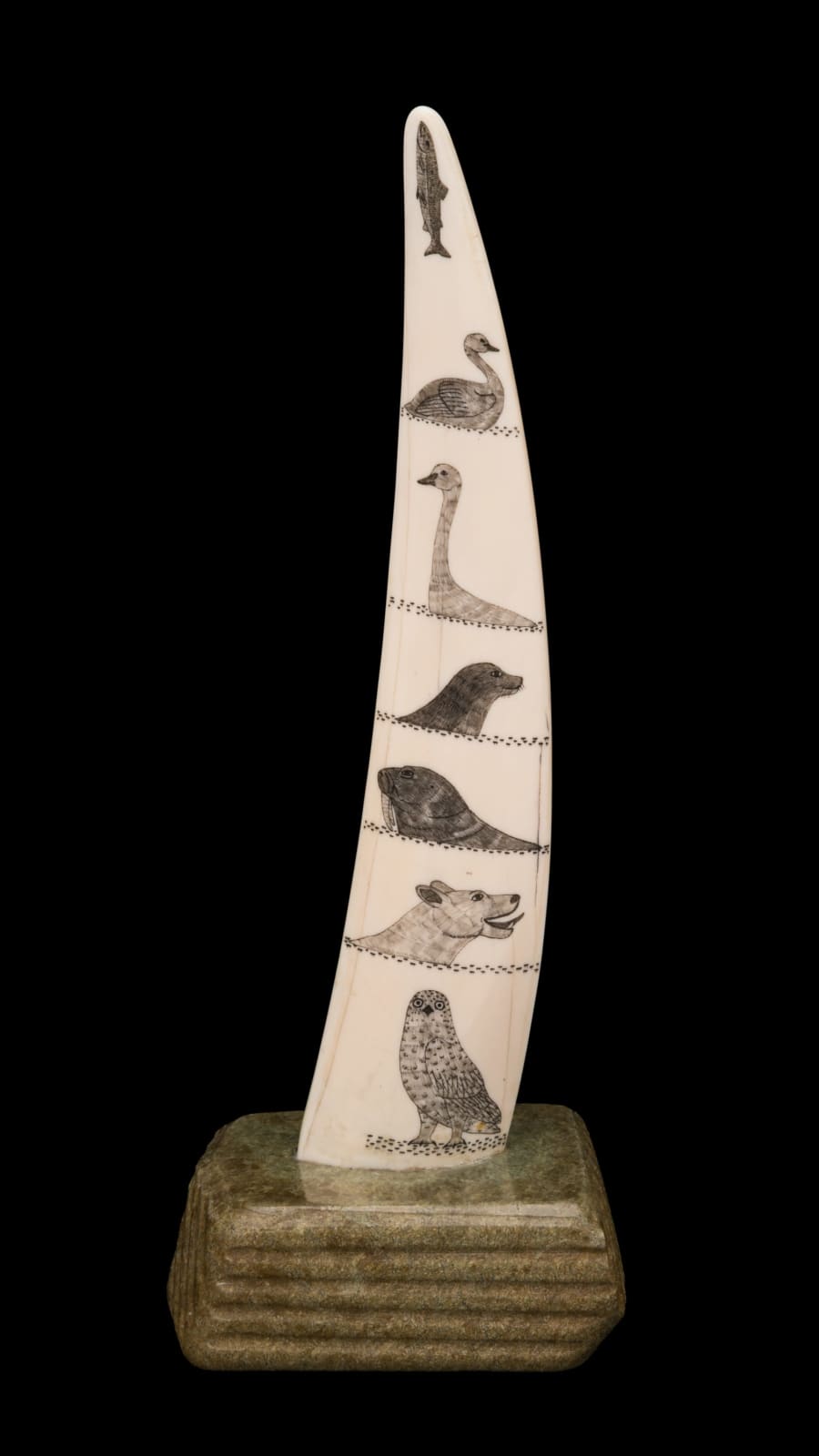 DAVIDEE ITULU (1929-2006) KIMMIRUT (LAKE HARBOUR), Incised Tusk with Inuit and Arctic Animals, mid-late 1970s