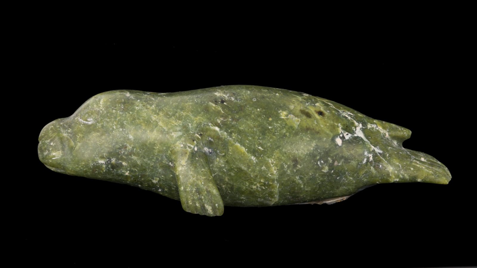 KEELEEMEEOOMEE SAMUALIE (1919-1983) KINNGAIT (CAPE DORSET), Swimming Seal, 1980s