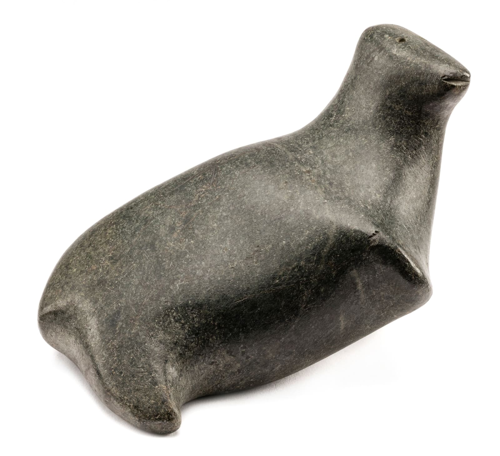 ANDY MIKI (1918-1983) ARVIAT/TIKIRAQJUAQ (ESKIMO POINT/WHALE COVE), Resting Seal, c. 1965-68