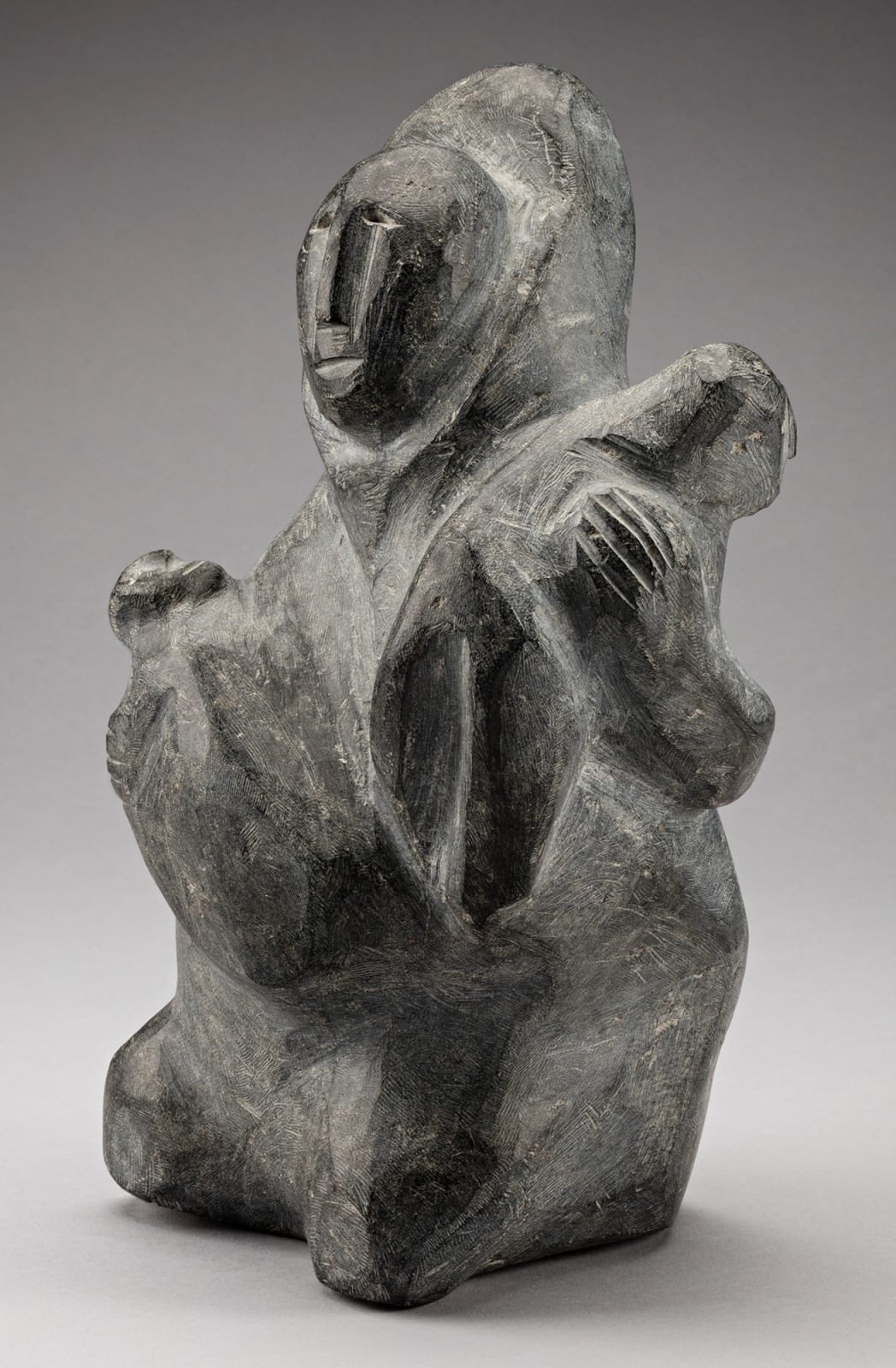 ELIZABETH NUTARAALUK AULATJUT (1914-1998) ARVIAT (ESKIMO POINT), Mother with Two Children, 1974