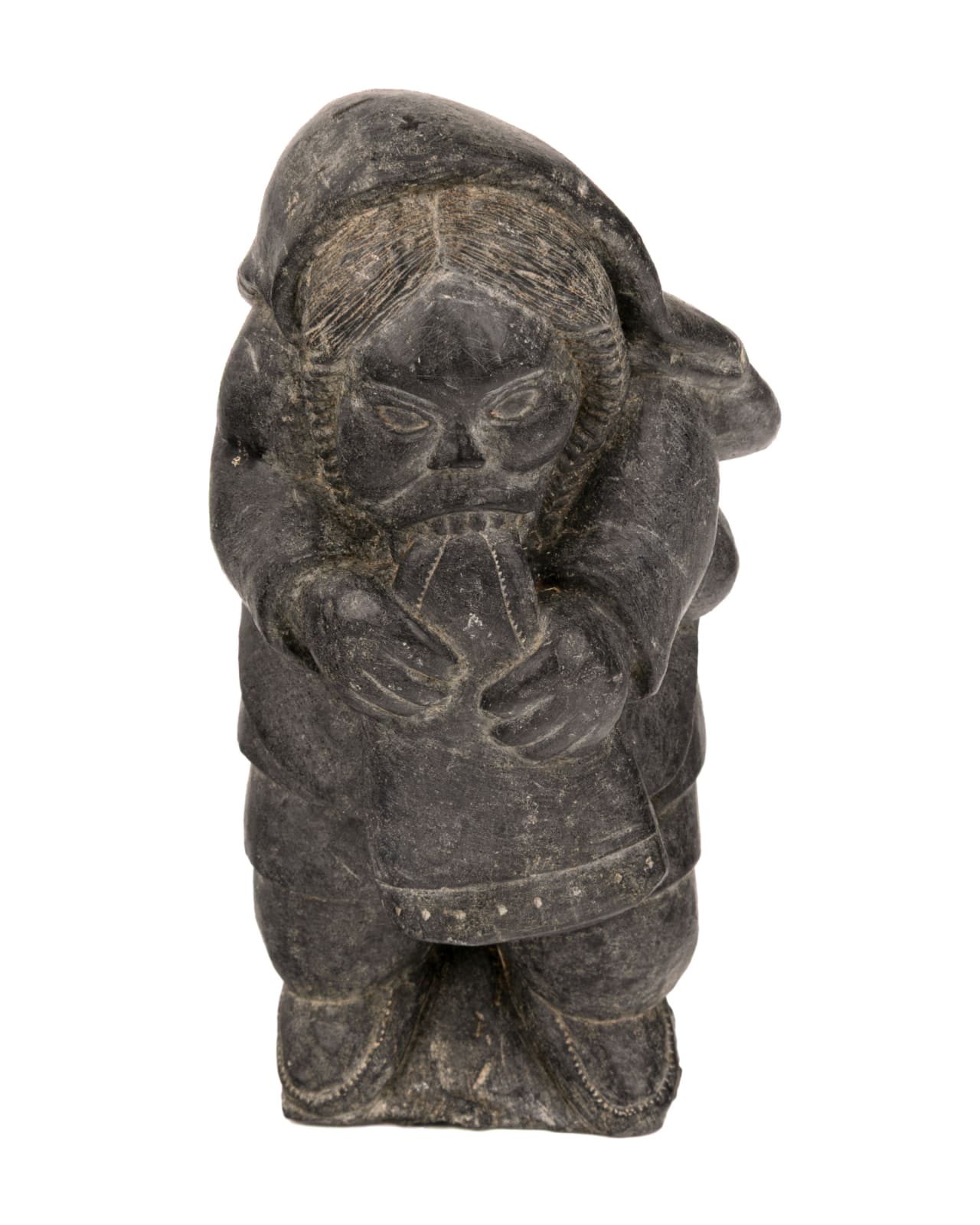 DAVIDEE SAUMIK (1925-1984) INUKJUAK (PORT HARRISON), Woman Softening a Kamik, 1962