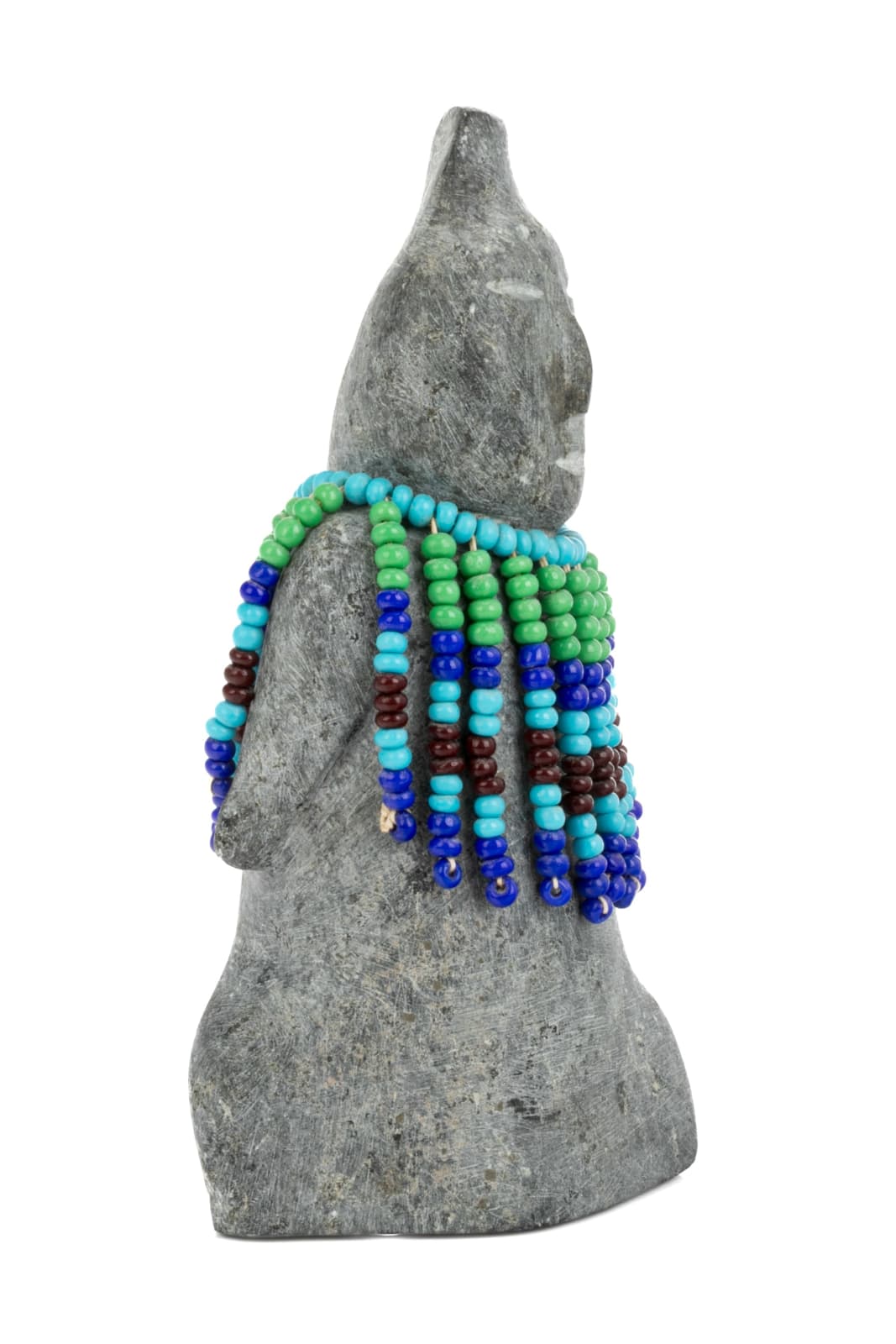 EVA TALOOKI ALIKTILUK (1927-1994) ARVIAT (ESKIMO POINT), Woman in a Beaded Amautiq with Coiffed Hair