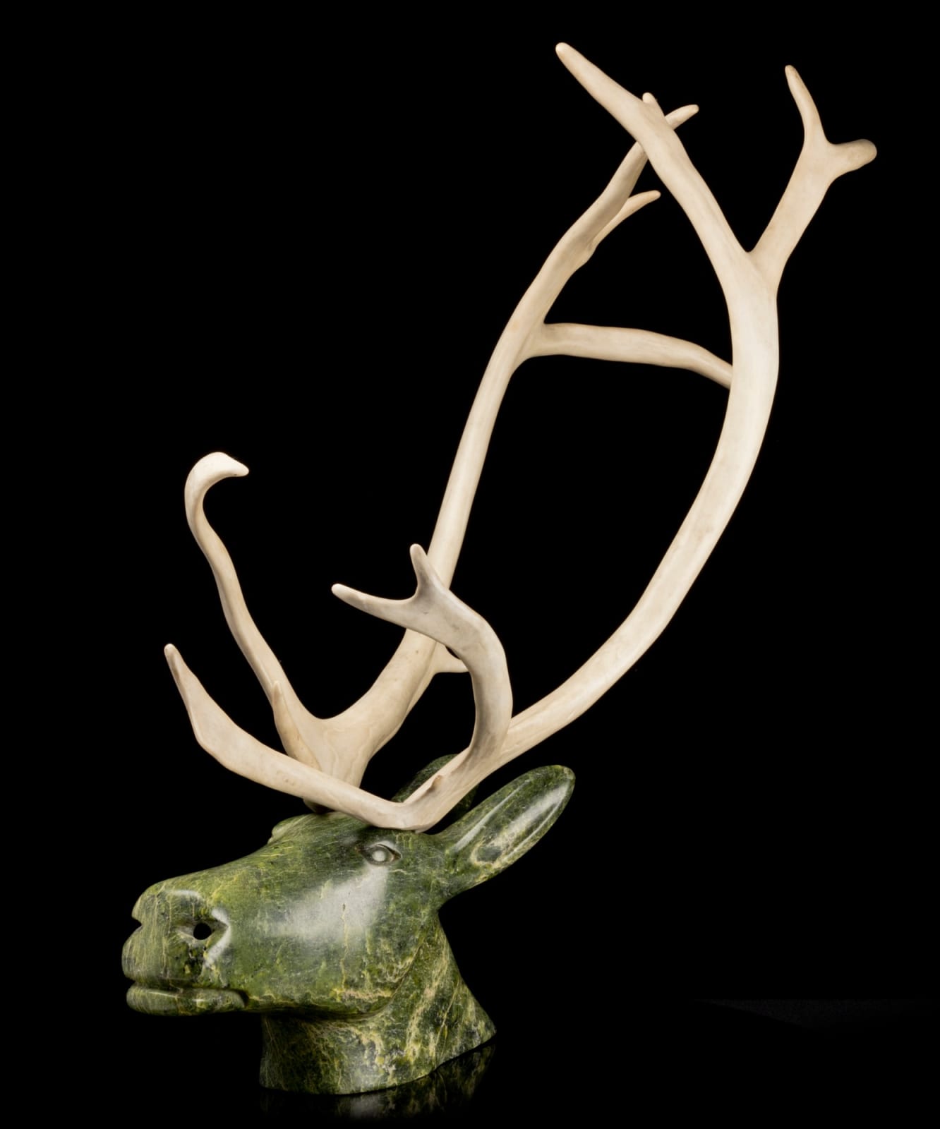 OSUITOK IPEELEE, R.C.A. (1922-2005) KINNGAIT (CAPE DORSET), Caribou Head Emerging from Water, c. early 1980s