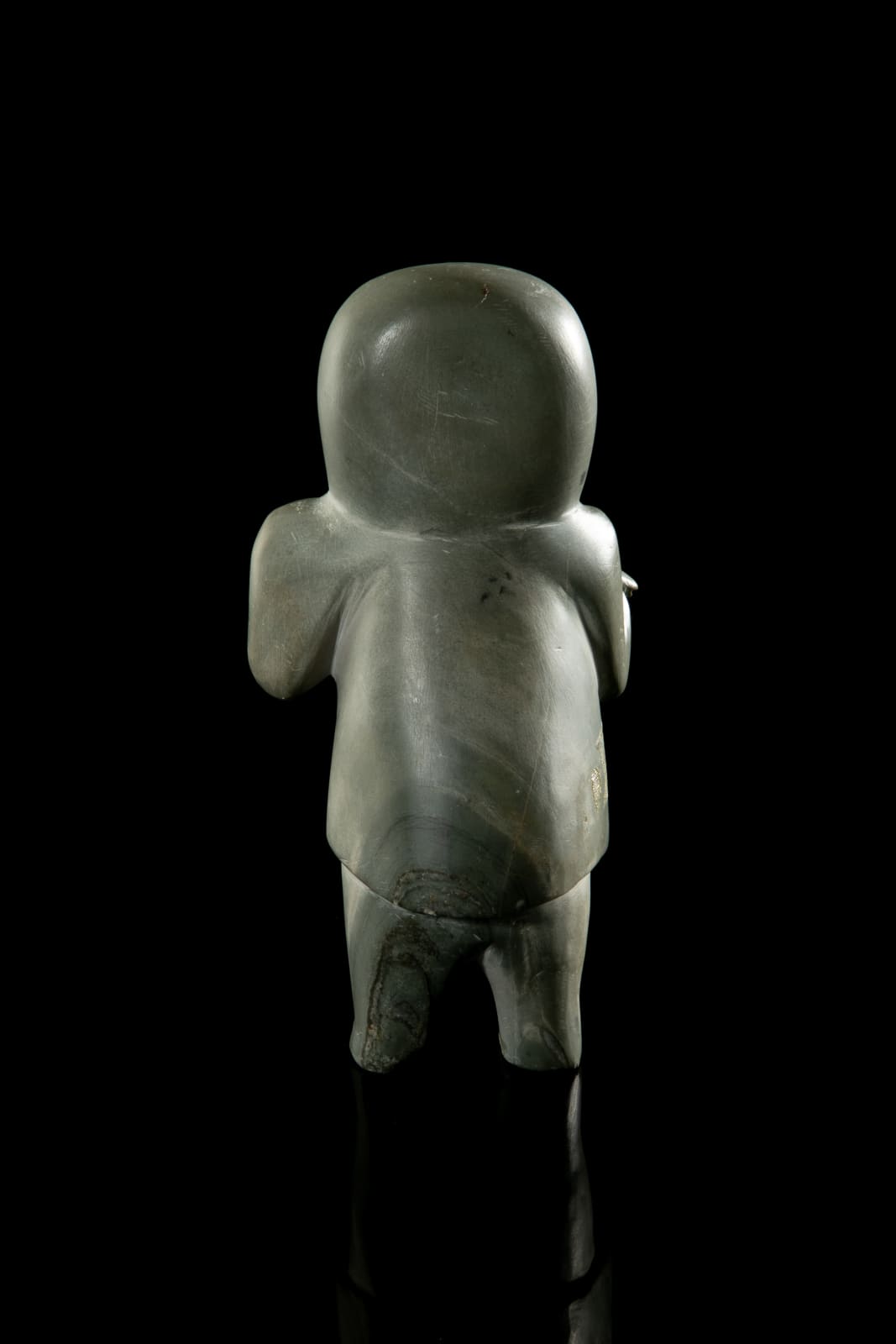 UNIDENTIFIED ARTIST, possibly SANIKILUAQ (BELCHER ISLAND), Standing Hunter with Caught Fish, 1960s