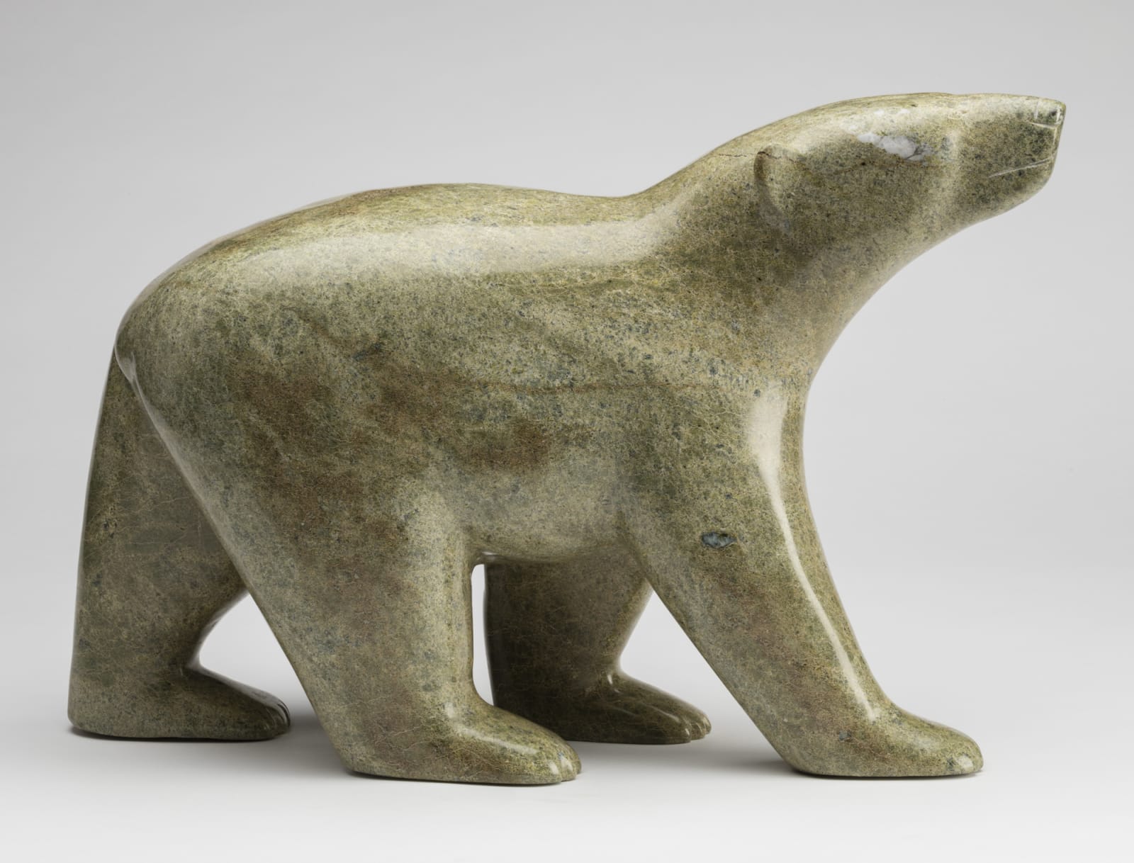 NUNA PARR (1949-) KINNGAIT (CAPE DORSET), Walking Bear , c. 1995