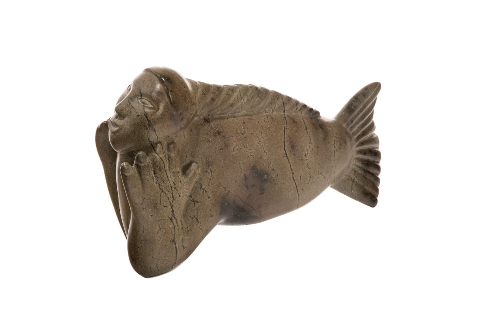 Attributed to: KENOJUAK ASHEVAK, C.C., R.C.A. (1927-2013) KINNGAIT (CAPE DORSET), Swimming Sedna with Plaited Hair, early-mid 1970s