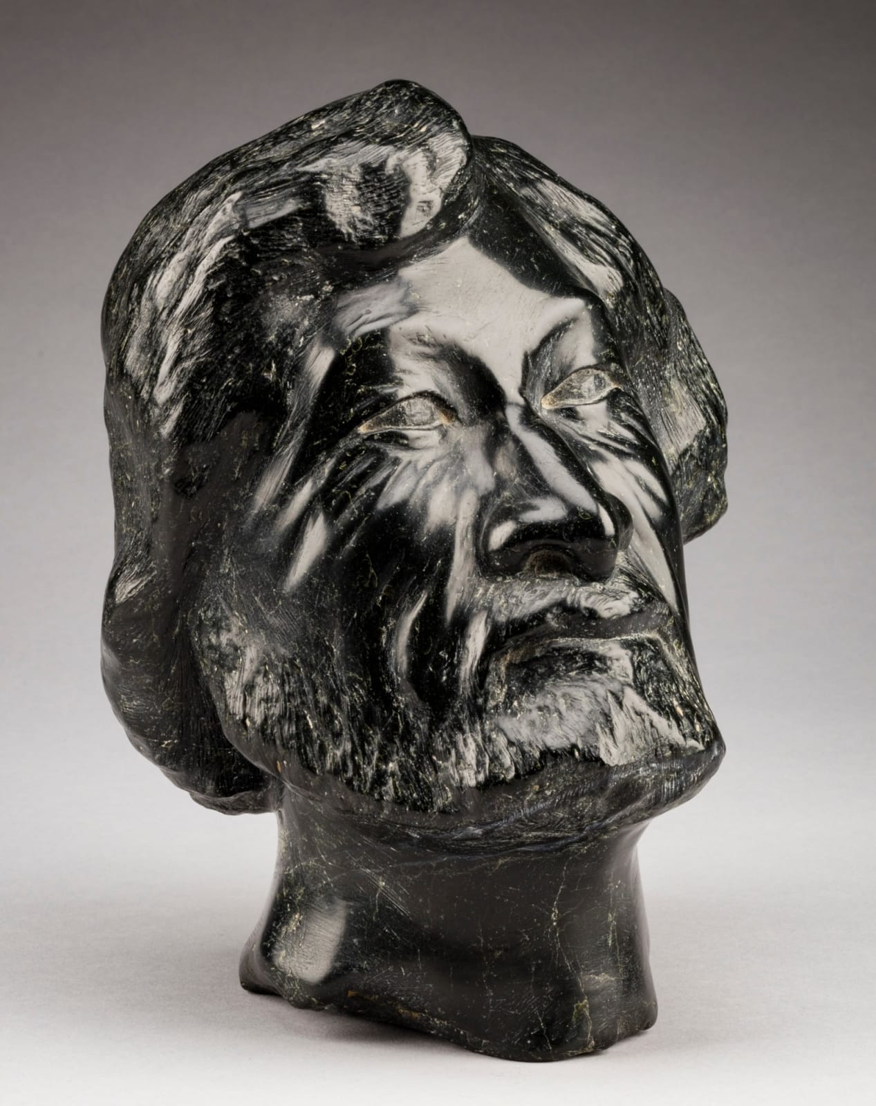 HENRY EVALUARDJUK (1923-2007) IQALUIT (FROBISHER BAY), Head of a Man (Self Portrait), probably early-mid 1980s