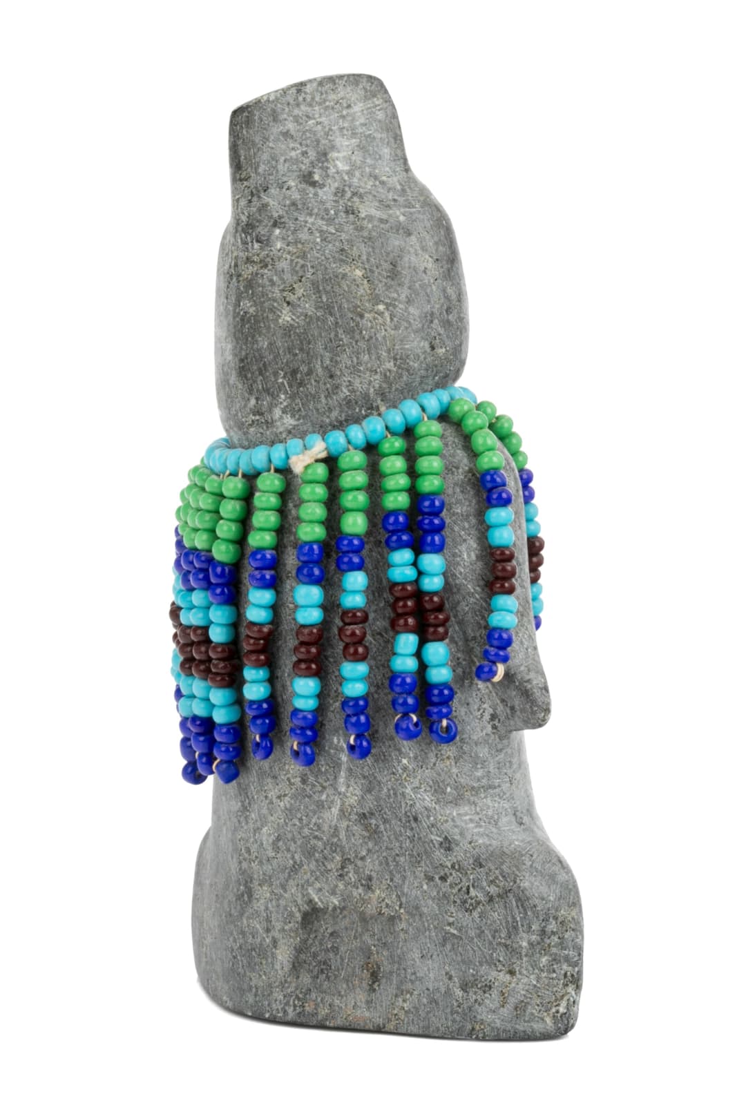 EVA TALOOKI ALIKTILUK (1927-1994) ARVIAT (ESKIMO POINT), Woman in a Beaded Amautiq with Coiffed Hair