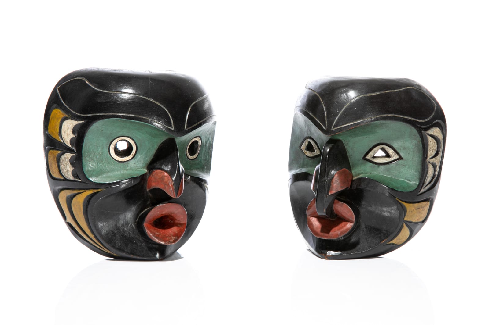 LLOYD WADHAMS SR. (1938-1992) TLAWITSIS (KALUGWIS), Wild Woman ( (Dzoonakwa) and Man Masks, late 1960s