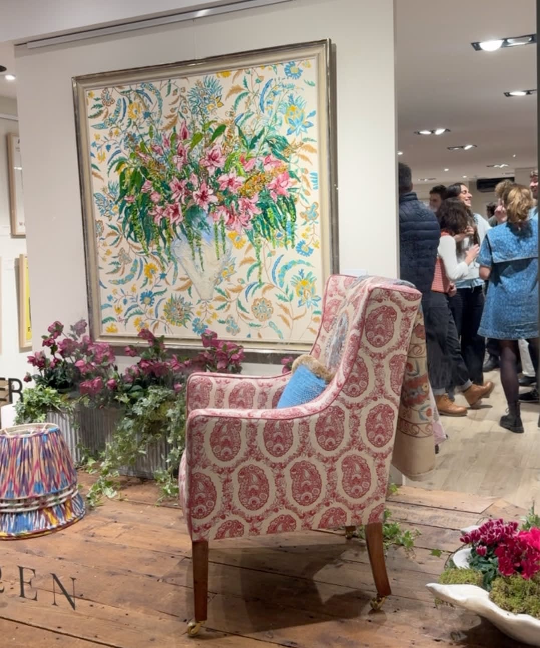 Chair upholstered in Susan Deliss Padishah linen in red blue cream