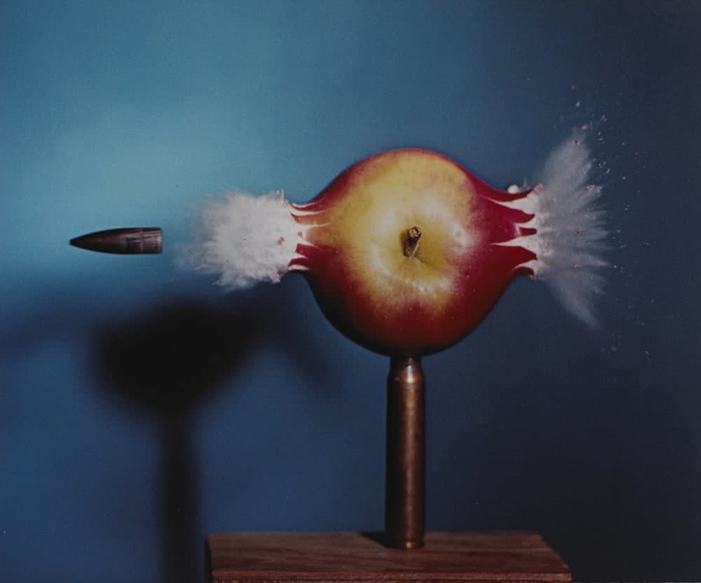 Harold Edgerton, 30 Caliber Bullet Piercing an Apple, 1964.