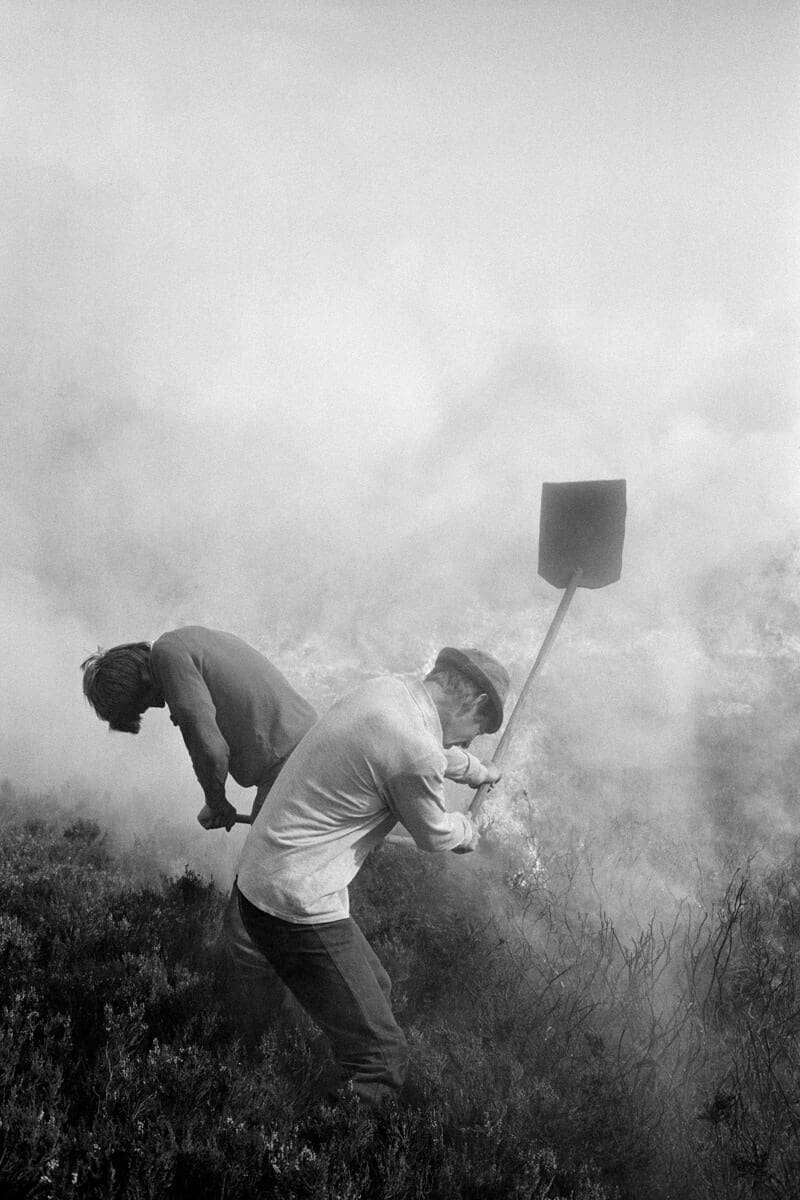 Martin Parr, Lord Savile's Gamekeepers burning heather, Hebden Bridge, England, 1976
