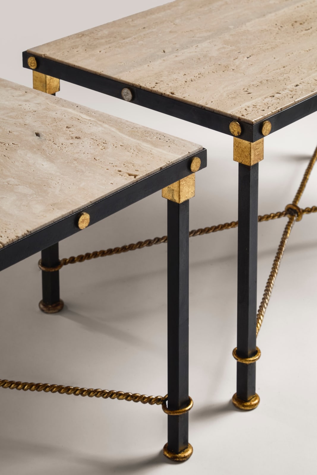 GILBERT POILLERAT, Pair of low tables , c. 1940