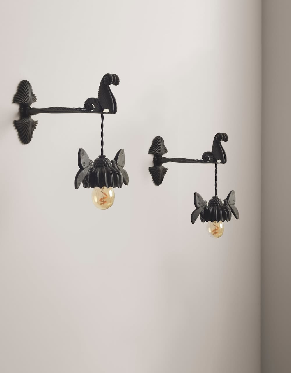 ARMAND-ALBERT RATEAU, Pair of wall lights , c. 1924