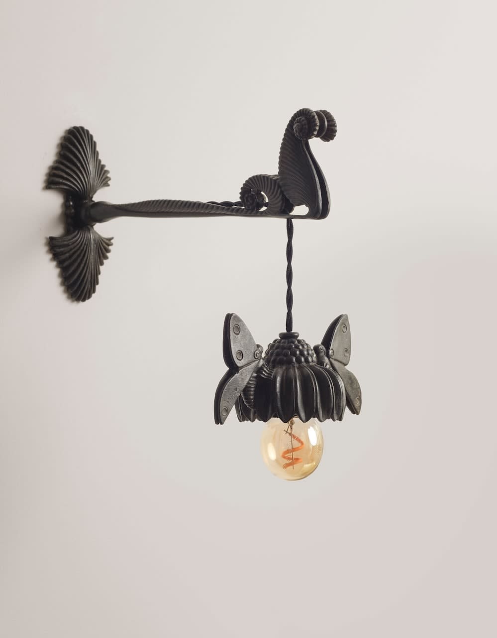 ARMAND-ALBERT RATEAU, Pair of wall lights , c. 1924