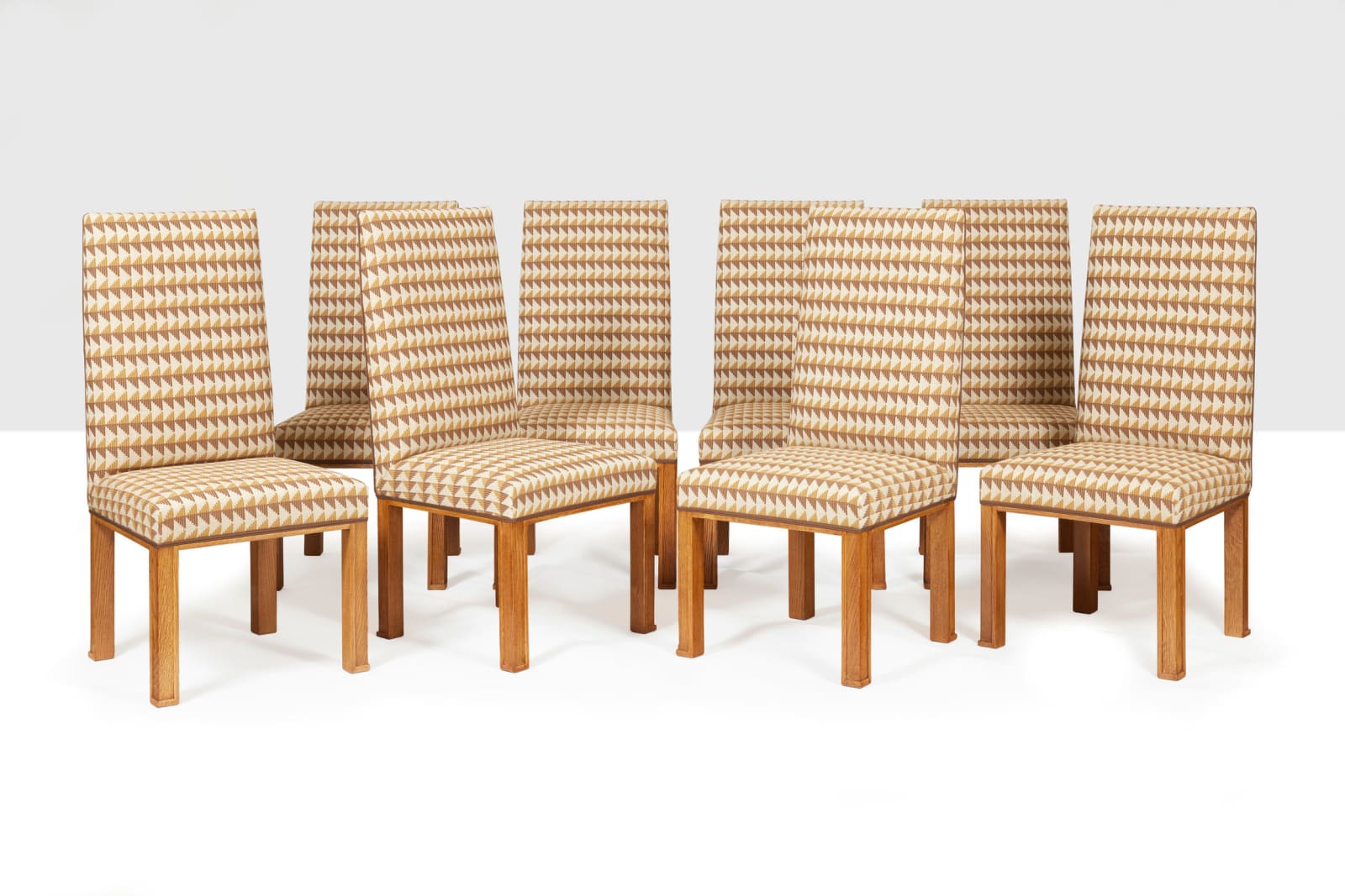 JACQUES ADNET, SET OF EIGHT CHAIRS, c. 1940