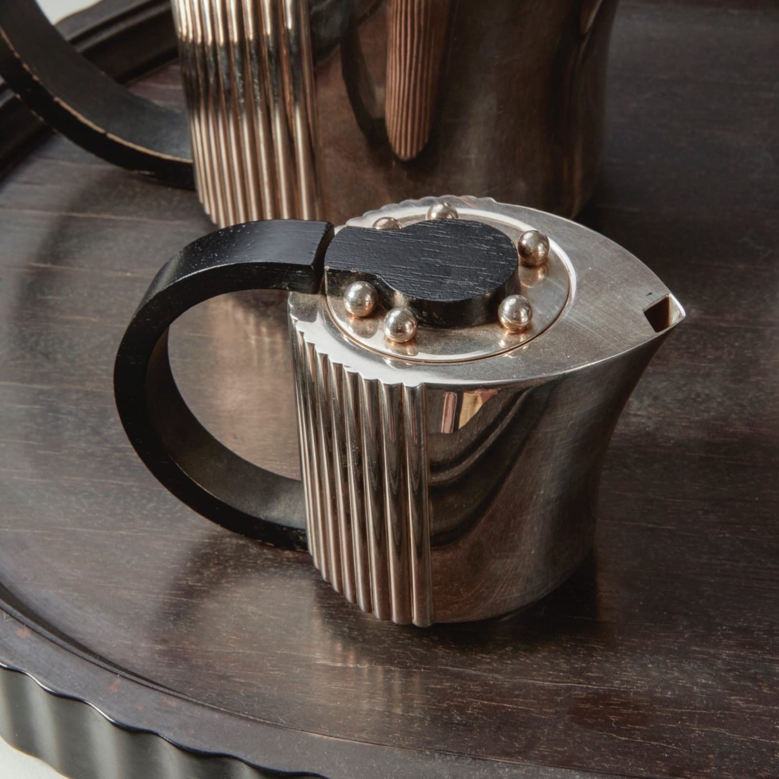JEAN PUIFORCAT, FOUR-PIECE 'ETCHÉA' TEA SERVICE ON THE TRAY, c. 1937