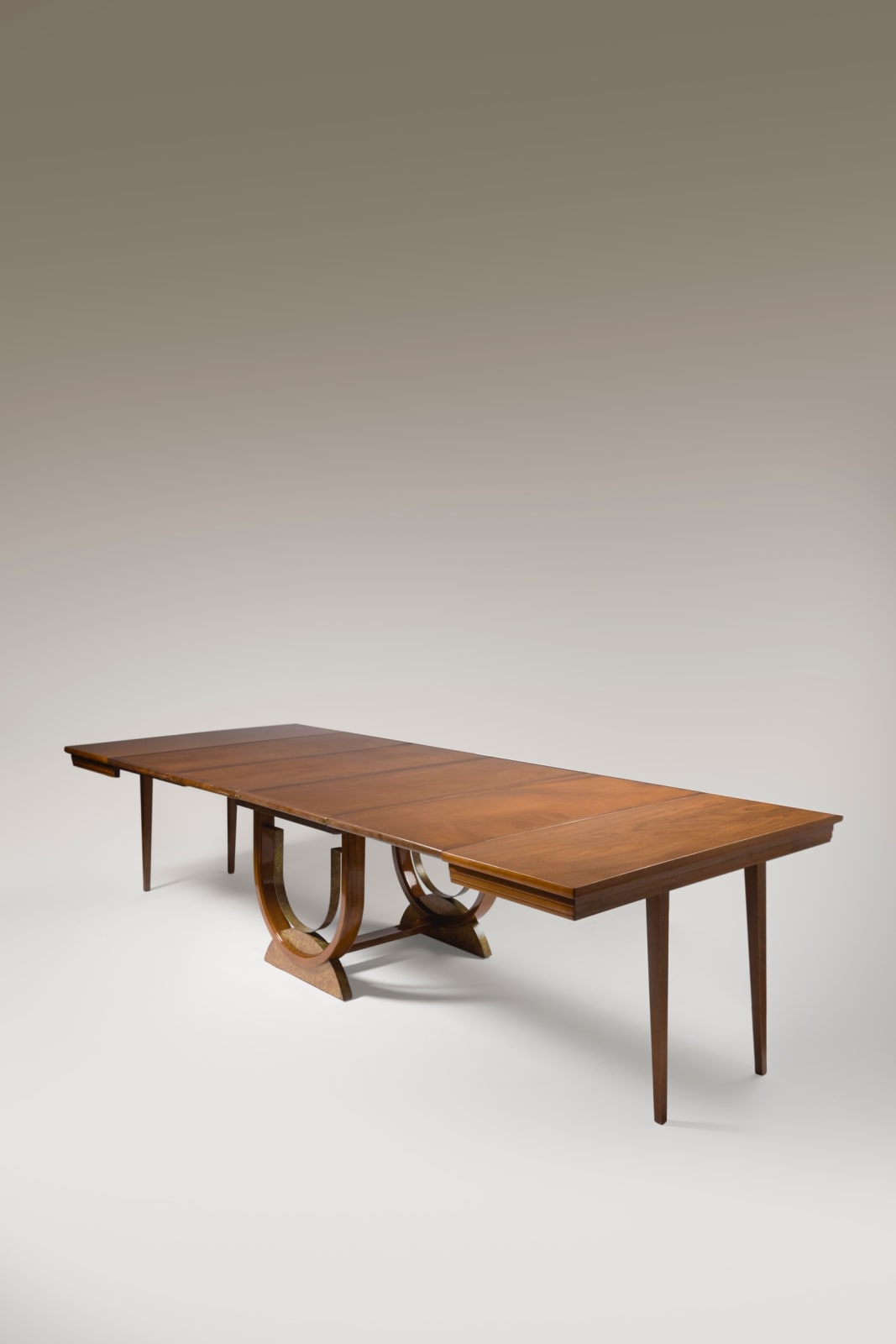 EUGÈNE PRINTZ, WALNUT DINING TABLE, c. 1935