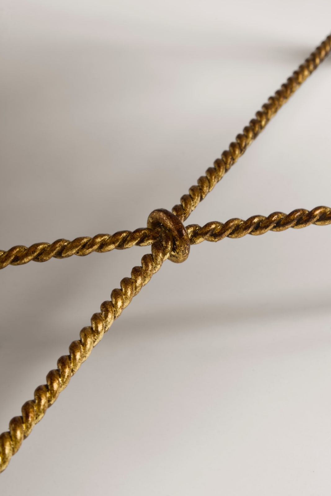 GILBERT POILLERAT, Pair of low tables , c. 1940