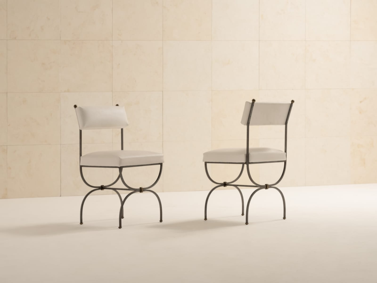 (In the style of) Gilbert Poillerat, Set of 8 chairs, c. 1950