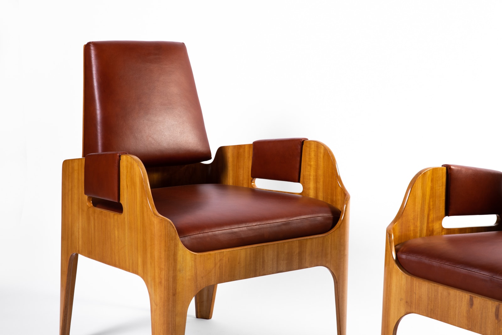 John Lloyd Wright, "SS Canberra" pair of armchairs, c. 1960