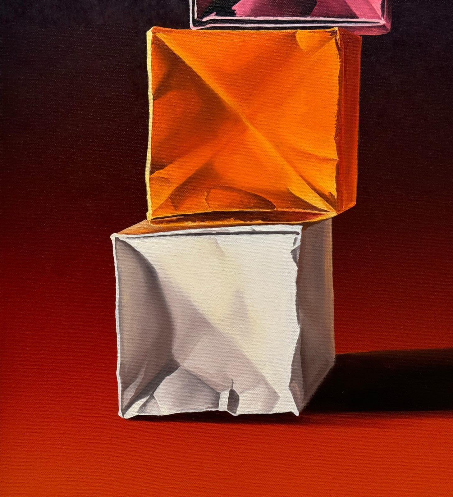 Paper boxes in two stacks on a purple to orange gradient