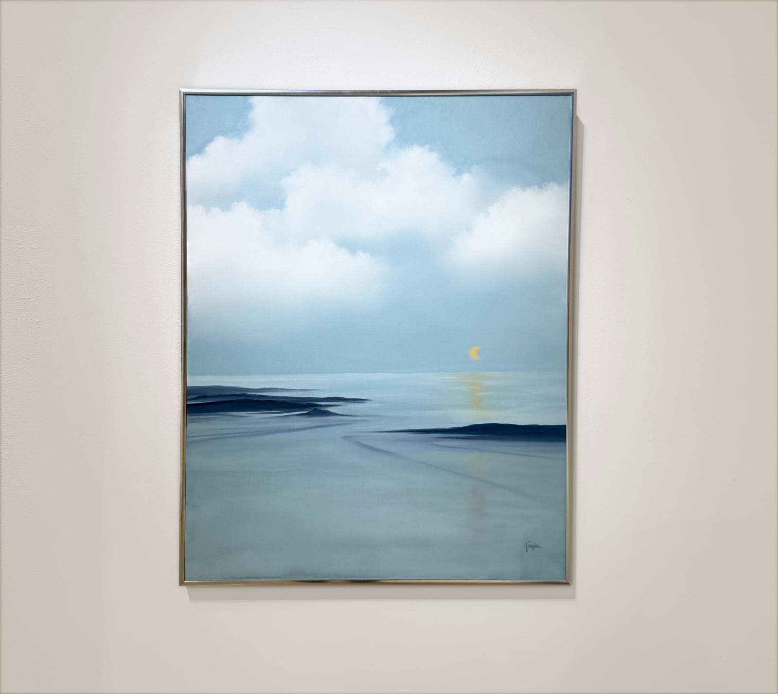 Painting of a blue landscape with moon