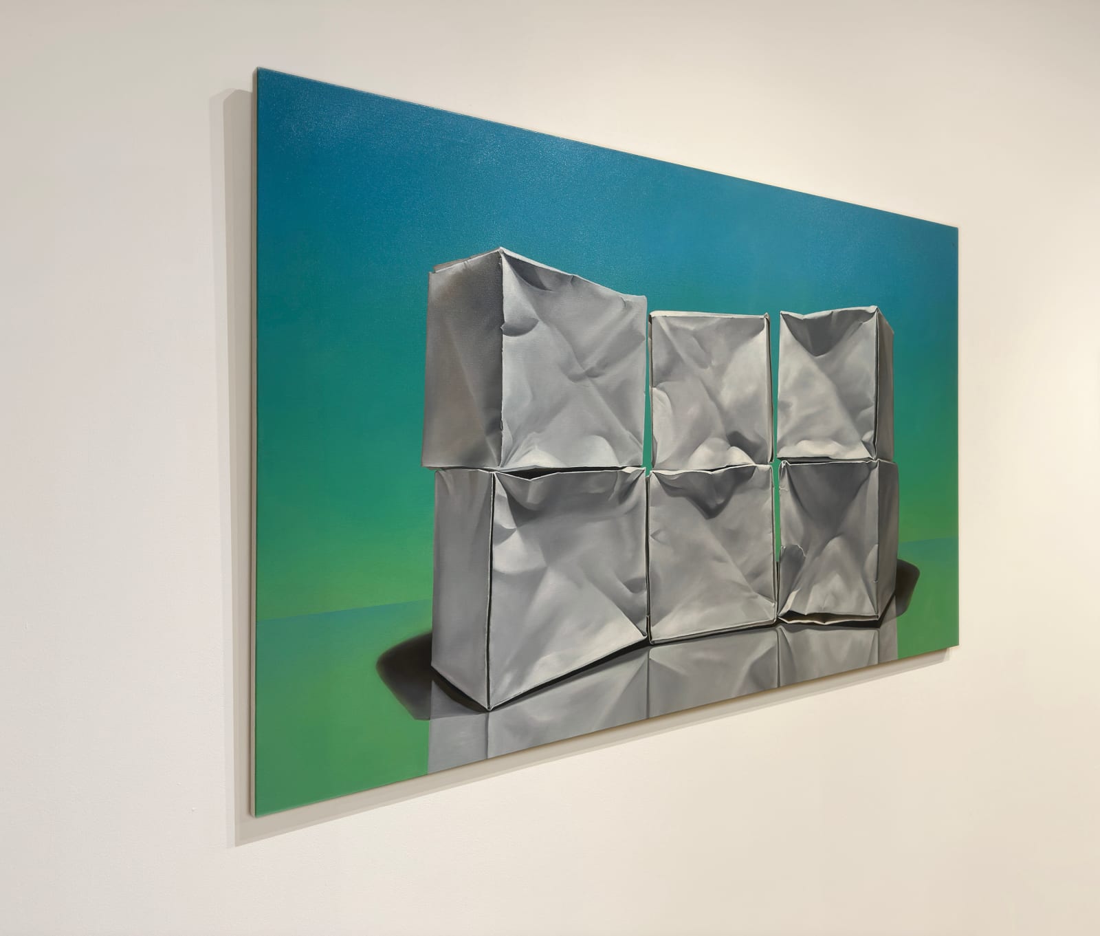 Offset column of 4 origami paper cubes with purple blue and black background