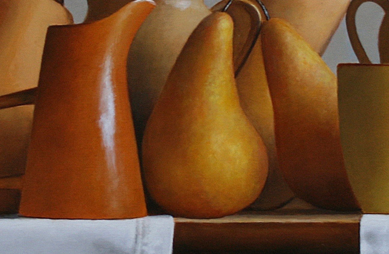 Orange and yellow fruits, vegetables, and cups on grey cloth