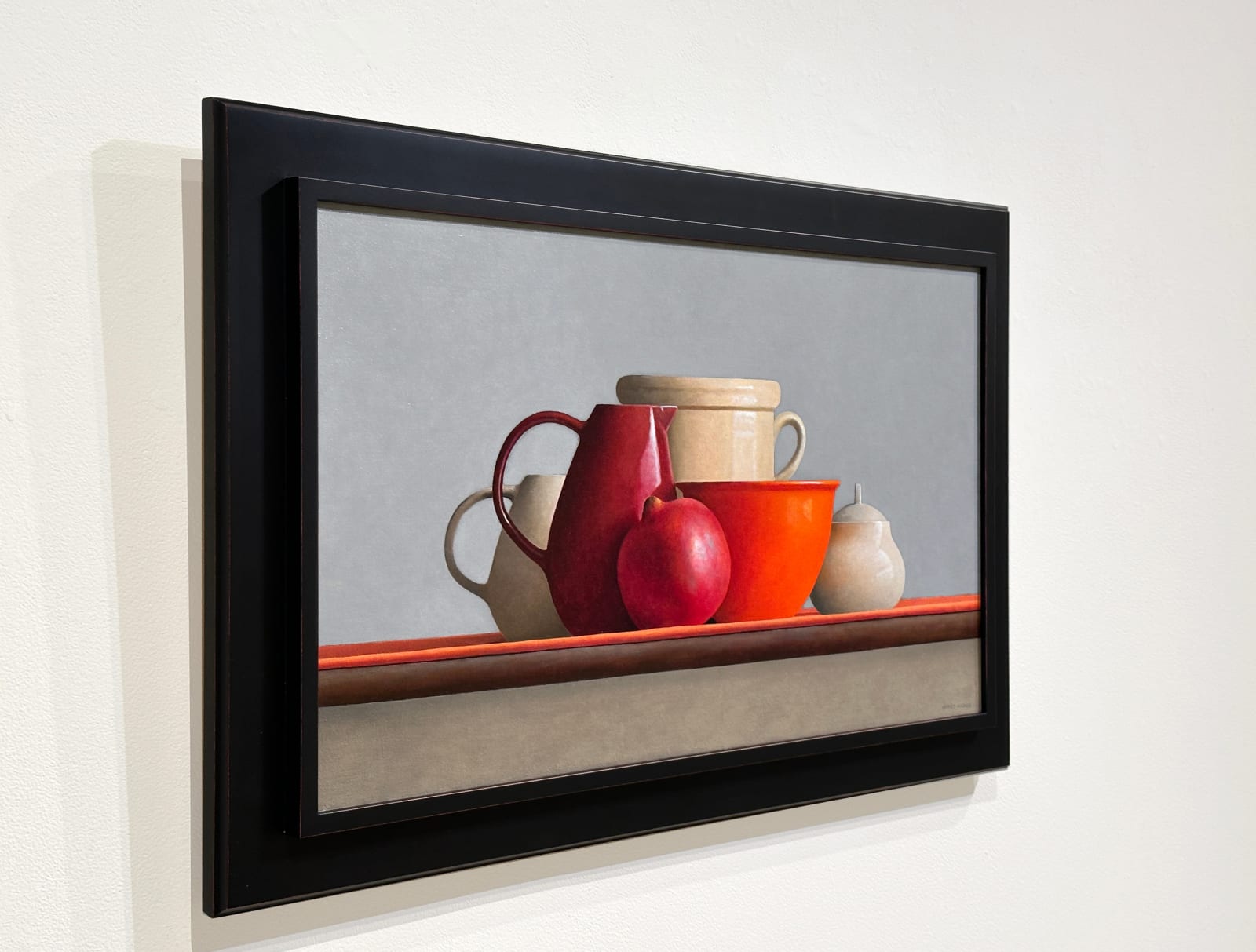 Still lIfe painting with white and red vessels and a pomegranate